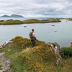 A hiker stops to take in the view in Ireland's County Kerry.
