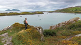 A hiker stops to take in the view in Ireland's County Kerry.