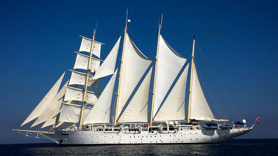The Star Clipper under full sail off Lombok, Indonesia.