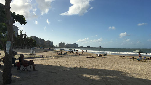 Beachgoers spending a late Saturday afternoon on Isla Verde beach in San Juan.