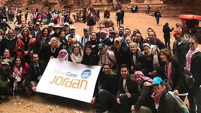 members of the Tourism Care delegation to Jordan in front of the Treasury in Petra.