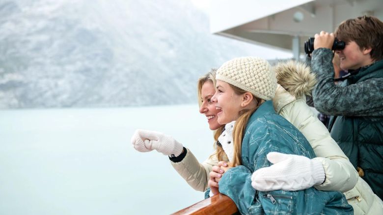 A family enjoying views of Holland America's privileged access to Glacier Bay National Park and Preserve