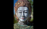 One of the many wooden statues at the base of the twin holy mountains of Phnom Pros and Phnom Srey (Man Hill and Woman Hill) in Kampong Cham.