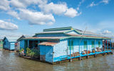 A floating house on the Tonle Sap River in Cambodia.