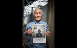 Bou Meng, one of the few survivors of the Khmer Rouge's notorious Security Prison 21 in Phnom Penh, holds a picture of his wife who was executed by the regime. The prison has been converted into the Toul Sleng Genocide Museum.