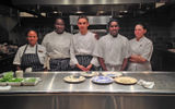 Some of the kitchen staff, headed by Chef Christophe Latard (center), in the cooking area of the Kitchen restaurant. Belle Mont Farm, where all food is organically grown on farmland is set between Mount Liamuiga and the Caribbean Sea, is so passionate about its farm-to-table experiences that each day's forage determines that day's menus.