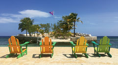 New beach huts at GoldenEye, the upscale compound built around Ian Fleming's Jamaican hideaway, are only an incremental step in Blackwell's plan to develop Oracabessa Bay into a thriving resort area. Pictured here, a view from the main beach towards a man-made island at GoldenEye.