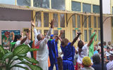 Performers at a Havana seniors center conclude a dance number.