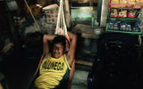 A shopkeeper in his shop on Corbisky Island.