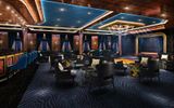 The Explorer Lounge will feature a golden proscenium outlying a small stage opposite a polished black marble bar.