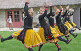 Muhu women folk dancers showing off both the dances and the traditional costumes for which Muhu is noted.