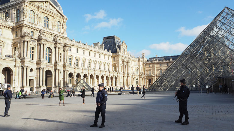 Senior editor Michelle Baran arrived in Paris on Nov. 18, six days after terrorists killed 129 people and injured scores more. Security forces were omnipresent at tourism sites throughout Paris, she writes, including at the Louvre.