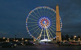 The Roue de Paris, a Ferris wheel at the Place de la Concorde, showcased colors of the French flag. In the aftermath of the terror attacks, numerous sites throughout the city and around the world showed their support for France by displaying the flag's colors.