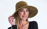 Another fashionable chapeau, this crocheted hat crafted by women knitters in Chiang Mai, Thailand, comes in a variety of seasonal colors. What sets it apart is an invisible wire that allows you to bend and mold Pure Handknit's Large Brim to create just the look you desire. Made of 100% cotton, the hat can be hand washed or dry cleaned. One size fits all.