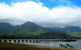 Hanalei Bay is one of Hawaii's most picturesque natural attractions and a popular place for surf lessons, thanks to an often beginner-friendly shore break with a sandy bottom.