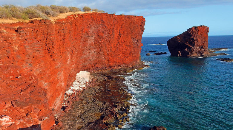 Just 141 square miles in size, Lanai is Hawaii's smallest visitor-friendly island and home to only 3,000 residents. But the often overlooked destination features a dramatic range of natural beauty. Pictured here, Puu Pehe, a stunning shoreline attraction is only a short walk from Hulopoe Beach Park.