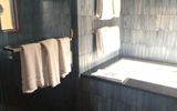 The piece de resistance of the master bedroom is a bathroom with dual vanity, hot tub and shower with rain-shower head.
