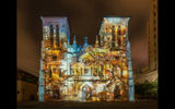 Another view of the cathedral's facade displaying the presentation.