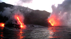 Kilauea Volcano on the Big Island of Hawaii has been continuously erupting since 1983, producing many lava flows that pour molten rock directly into the Pacific Ocean. The primordial light shows are tough to forecast, but when they do occur, dawn boat tours out to the entry sites offer an unforgettable experience. Photos by Shane Nelson; posted Oct. 18, 2013