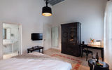 Israel has gone full steam ahead on the modern hospitality and tourism front, with top properties popping up across the country over the last couple years, complemented by unique activities available from Tel Aviv’s hip haunts to Jerusalem’s Old World wonders and the Sea of Galilee. Pictured here, the bedroom in a suite at Efendi, a historical property set on Israel’s north coast in the old city of Acre, a Unesco World Heritage site.