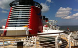 During a preview cruise aboard the Disney Fantasy, Cruise Editor Donna Tunney sampled Disney Cruise Line's newest ship and visited Disney's private island, Castaway Cay. Pictured here, the Disney Fantasy, with it's signature red funnel, at its dock in Port Canaveral. Photos by Donna Tunney; posted April 3, 2012