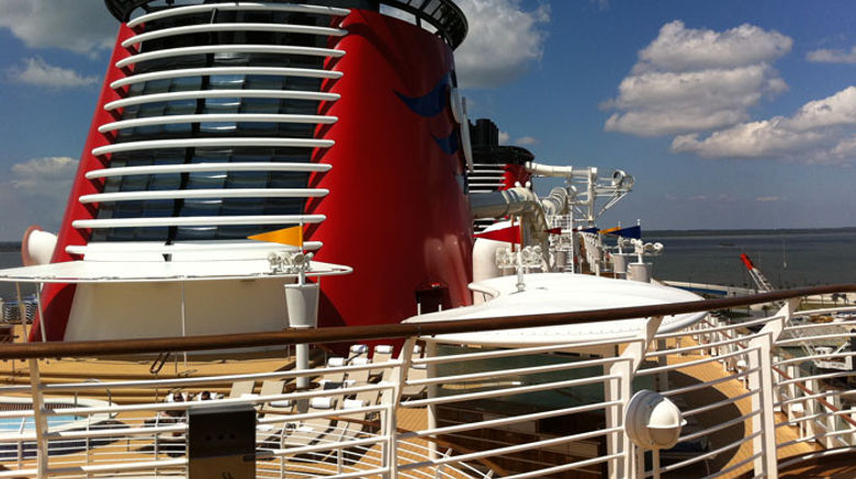 During a preview cruise aboard the Disney Fantasy, Cruise Editor Donna Tunney sampled Disney Cruise Line's newest ship and visited Disney's private island, Castaway Cay. Pictured here, the Disney Fantasy, with it's signature red funnel, at its dock in Port Canaveral. Photos by Donna Tunney; posted April 3, 2012
