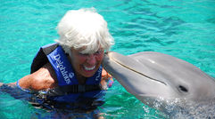 Travel Weekly's Mexico Editor Gay Nagle Myers spent a few days exploring the Riviera Maya in Mexico. Here, Gay gets a kiss from Kanek, one of 24 bottlenose dolphins at the Swim with Delphinus site located just south of Playa del Carmen.