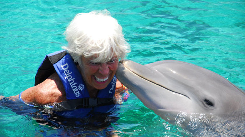 Travel Weekly's Mexico Editor Gay Nagle Myers spent a few days exploring the Riviera Maya in Mexico. Here, Gay gets a kiss from Kanek, one of 24 bottlenose dolphins at the Swim with Delphinus site located just south of Playa del Carmen.