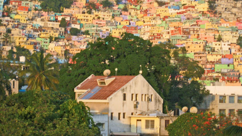 A recent trip to Haiti offered a brief glimpse into a country intent on moving forward out of poverty and the damage of the January 2010 earthquake into a tourist destination offering Creole culture, crafts and cuisine plus music and mountains, beaches and boutique hotels and art and architecture. Pictured here, early morning sunlight brightens the hillsides of Petion-Ville, a suburb of Port-au-Prince. Photo by Melanie Reffes
