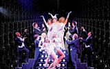 Cruise entertainment is being reshaped by a combination of technology, changing consumer tastes, competition, growing ship size and a revolution in the way dining works on ships. Pictured here, a Holland America Line show produced by RWS Associates.