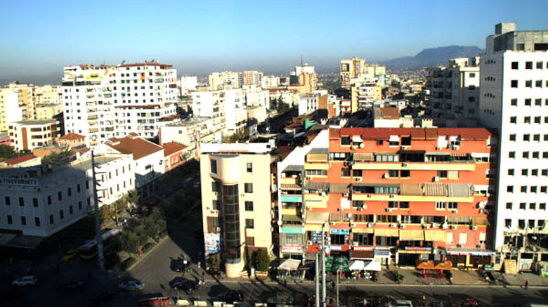While no one was looking, Albania transformed itself into a destination with considerable appeal for American tourists. Reporter Nadine Godwin traveled to the country recently for a first-hand look at its appeal. Shown here, colorful buildings in Albania's capital city, Tirana.