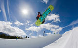 A snowboarder in a terrain park at Breckenridge Ski Resort.