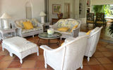 The living room, dining room and kitchen at the Day-O villa offer seamless indoor/outdoor living.