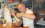 Barista Jay Lucifer is one of six Italian brothers who own the Social Club on St. Viateur Avenue in the Mile End neighborhood of Montreal. Photo by Melanie Reffes