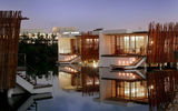 Rosewood Mayakoba's 128 luxurious suites are built over several islands and a beachfront, connected by bridges and pathways where golf carts transport guests from the beach to an island spa to two restaurants, a tequila bar with a tapas menu, a game room, and three pools.