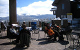 People enjoying a sunny day at Sevens, a new slopeside restaurant, at Breckenridge ski resort.