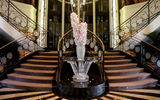 Oceania's signature staircase in its atrium was designed by Lalique for the Marina. TW photo by Johanna Jainchill