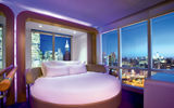 The push of a button enables Yotel's 170-square-foot "cabins" to switch between "lounge" and "bed" modes.