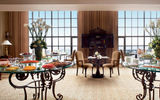 The rooms and suites in the Club Level include access to a lounge filled with couches, comfy chairs and small tables, where guests can help themselves to five daily "presentations," or complimentary food setups.