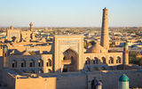 The sun sets on the Madrassah of Muhammad Amin-Khan in Khiva, Uzbekistan. Photo by Lindsay Fincher