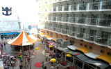 The Boardwalk neighborhood as seen from a Boardwalk balcony cabin, looking out towards the sea and the AquaTheater.