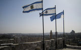 Flags flying over Jerusalem's Old City.