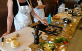 The Bon Appetit Culinary Center is a cooking school on the Marina where two people share one of 24 individual cooking stations and prepare meals. TW photo by Johanna Jainchill