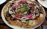 Punta Bonita's creative Mexican menu includes Tlayudas, Oxacan style "pizza" made with tortillas.
