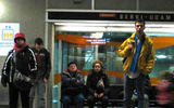 Commuters await at a Metro train at the central Berri-UQAM station, a major transfer point.