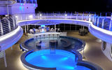 The Quiet Cove pool at night. The adults-only pool has its own bar and is adjacent to the Cove Cafe coffee shop.