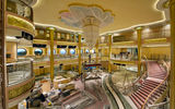 The ship's atrium is filled with scaffolding now, but its first revenue cruise is March 31.