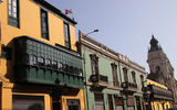 Colorful houses seen on a side street near Lima's Plaza Mayor.