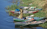 Young fishermen-to-be at play on the shores of the Nile near Luxor. Pollution remains a problem on the river.