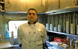 Pullman Rail Journeys' chef Marc Guzman turns out three meals a day in a compact, efficient kitchen.